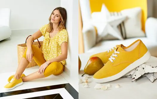 A woman in yellow wearing yellow canvas shoes shown on the right