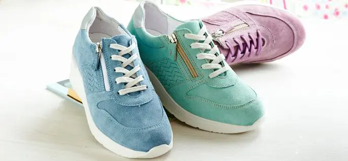 A trio of pastel coloured trainers
